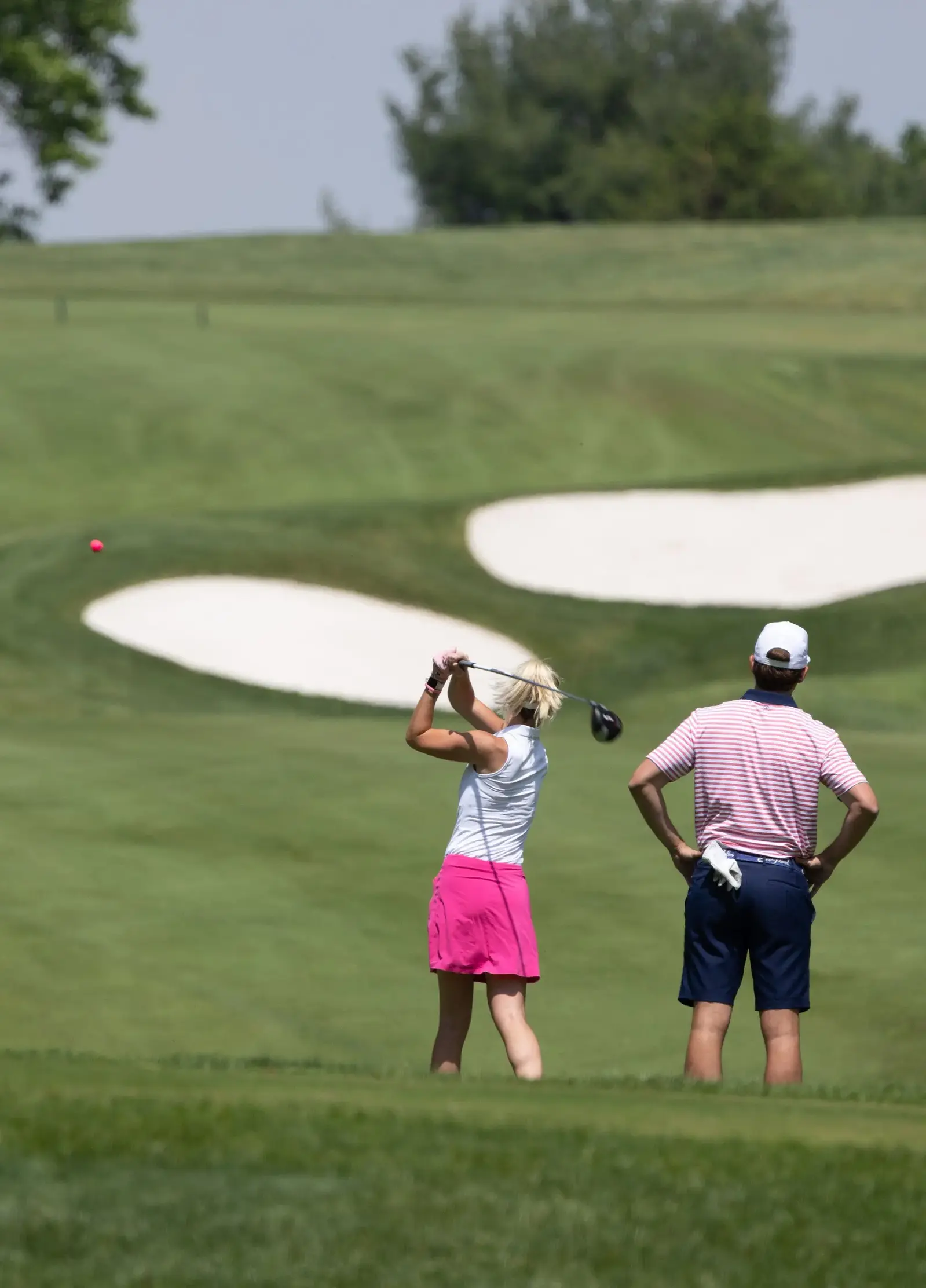 playing golf