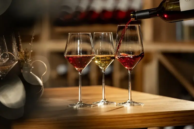 pouring wine into glasses
